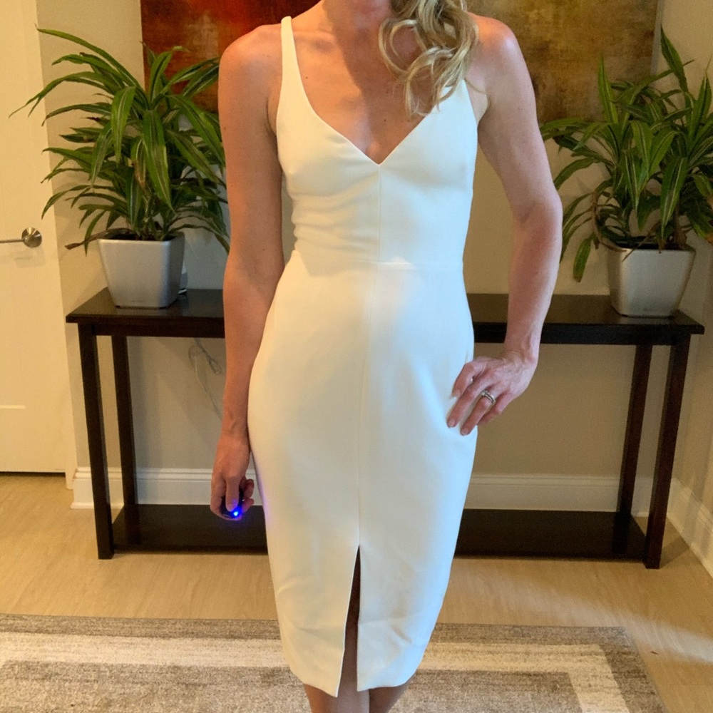 Likely size 2 white v-neck cocktail dress